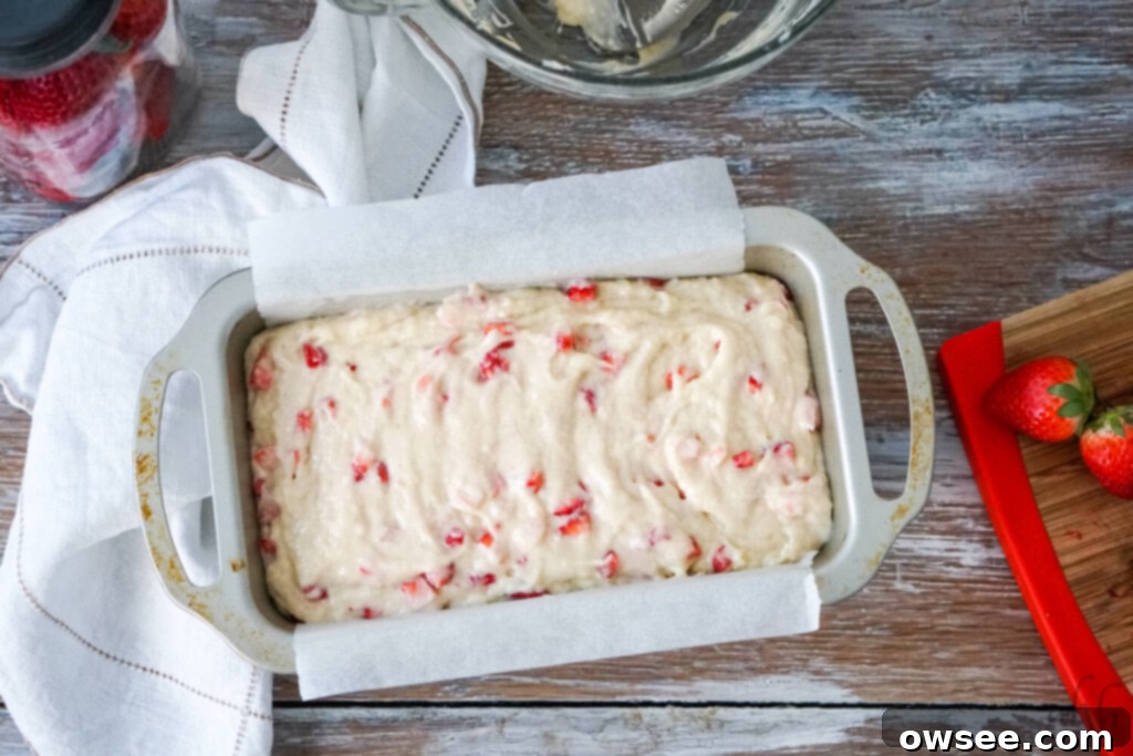 Simple Strawberry Yogurt Loaf 9 Bake for about an hour or until the top is lightly golden.