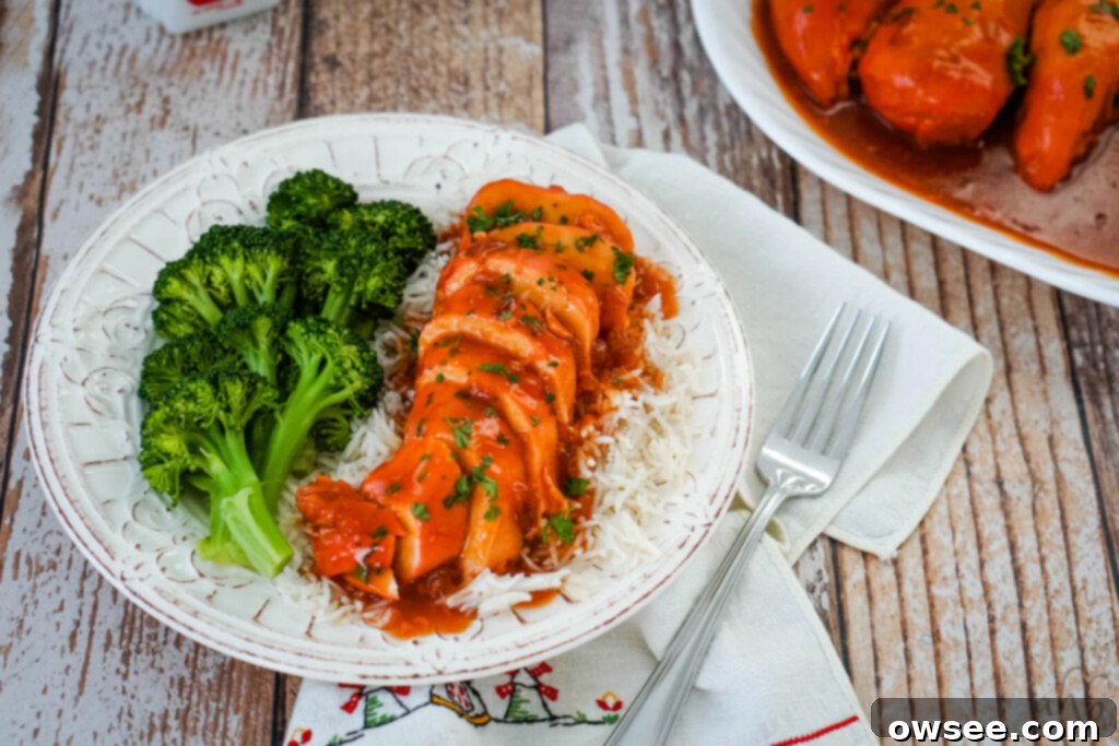 Sunset Catalina Chicken Feast 6 A serving of catalina chicken with rice and broccoli on a white plate.