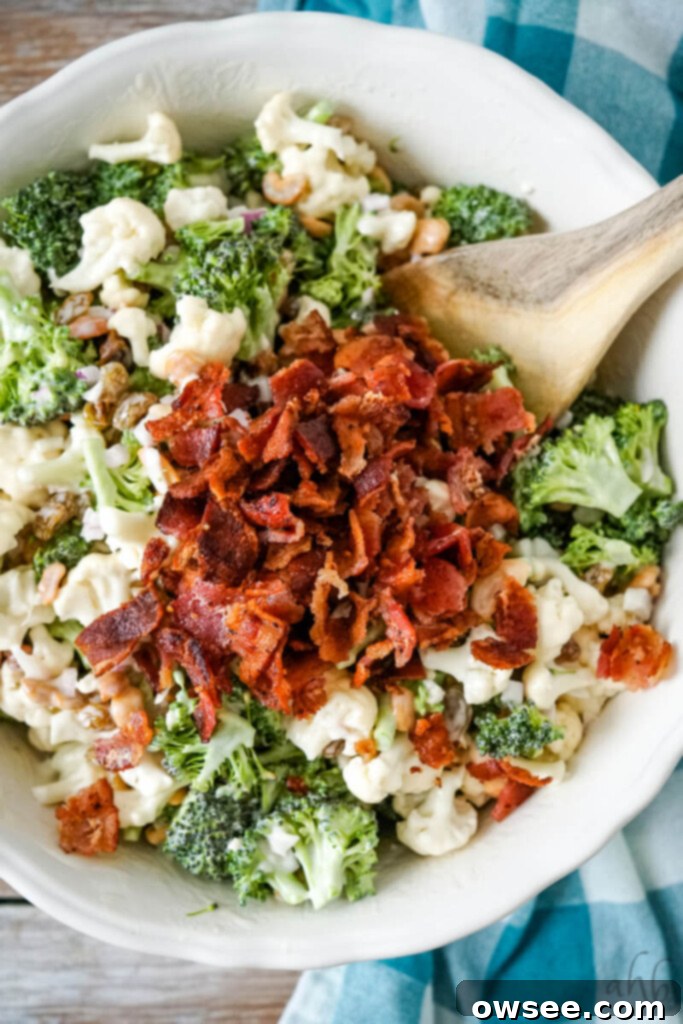 Creamy Amish Broccoli Cauliflower Medley 7 Bacon is stirred into the salad just before serving.