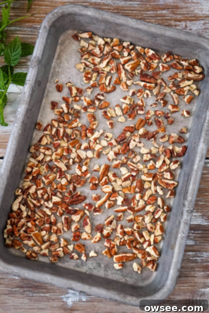 Vibrant Cranberry Couscous Salad 6 A small sheet pan of perfectly toasted pecan pieces, golden brown and aromatic.