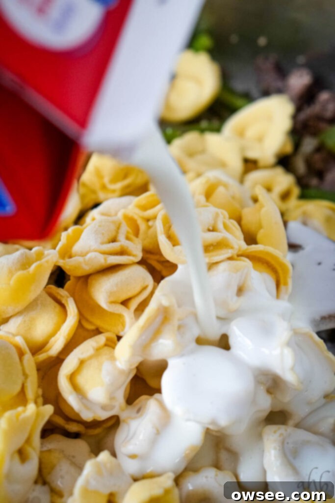 Philly Cheesesteak Filled Tortellini 6 Frozen tortellini and heavy cream are added to the pan with the cooked steak, onions, and peppers.